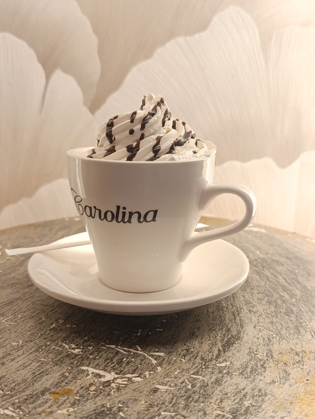 Carolina's whipped-cream mocaccino — served in the house cup