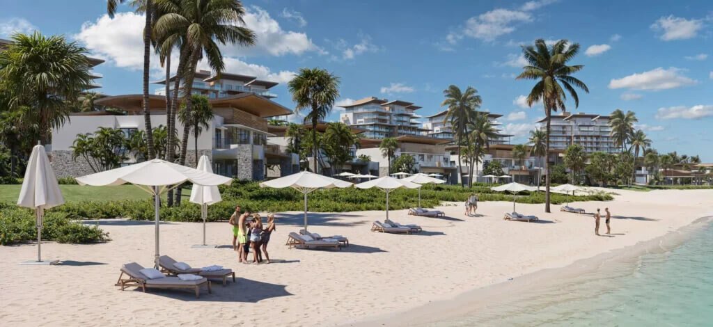 The beach strip at Playa Escondida Resort, with pale sand and calm water